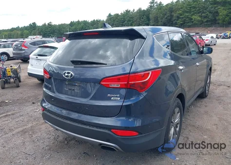 2015 Hyundai Santa Fe Sport 2.4L z USA, uszkodzony, nr VIN 5XYZTDLB5FG298115